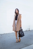 Blogger in Camel Structured Sleeveless Jacket