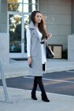 Blogger in Grey Tailored Sleeveless Jacket